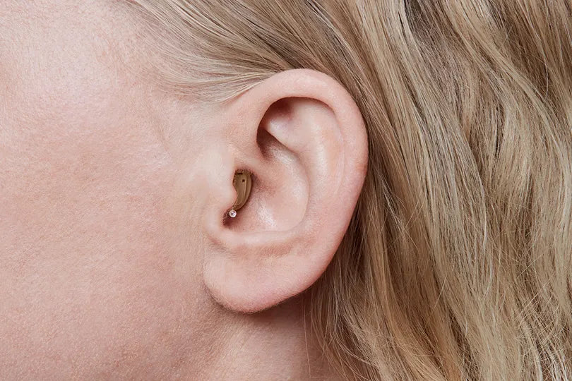 Oticon invisible-in-the-canal Hearing Aid | St. George Audiology | Kerala